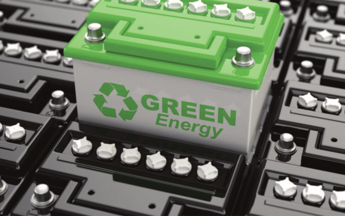 Green battery stock image