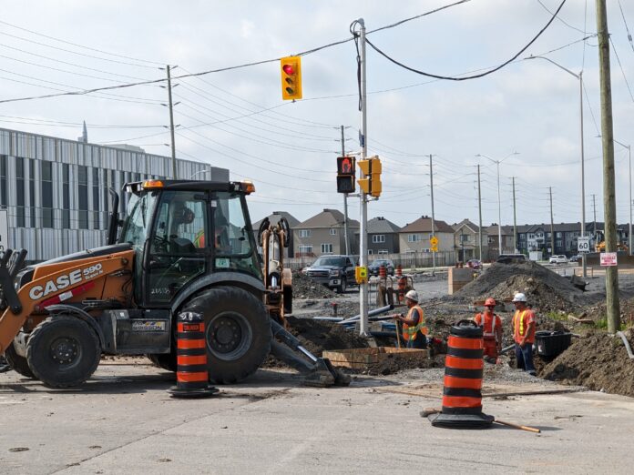 Road work on Strandherd Drive near the recently constructed French public Pierre-de-Blois high school